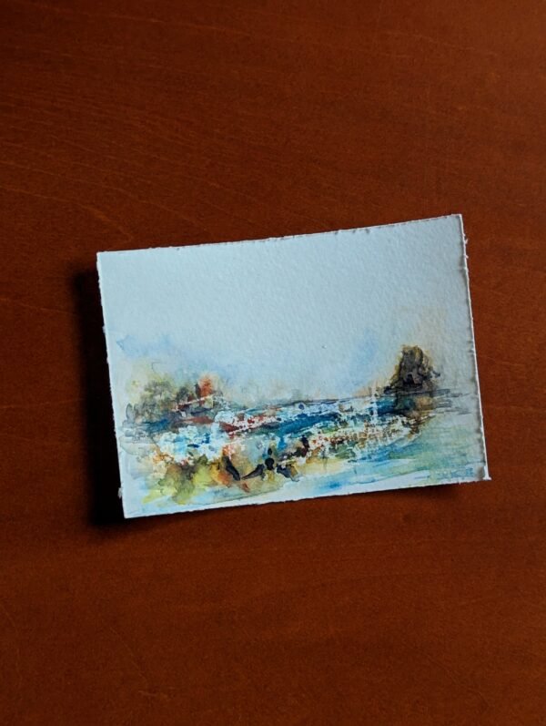 miniature seascape painting with blues and greens and distant cliffs